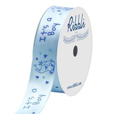 a roll of blue ribbon with hearts and words on the side that says it's love