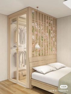 a bed sitting next to a closet in a bedroom