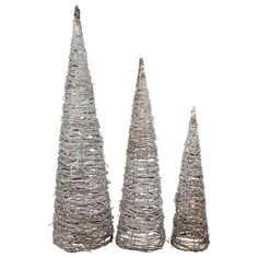 three metal christmas trees sitting next to each other