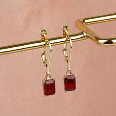 It is a stone that represents passion, true friendship,success and consistency. Our 14K solid gold and rectangular cut dangling garnet earring is suitable for daily use with its special design and is a stylish jewelery that you can use on your special days and gift it to your loved ones. A stylish jewel for you and your loved ones. Time to pamper yourself and your loved ones... Garnet is the birthstone for those born in January. 🤍🤍 Special gifts for your special moments. We produce our jeweler Rectangular Earrings For Formal Occasions, Elegant Earrings With Rectangular Stone For Anniversary, Rectangular Gemstone Earrings For Anniversary, Classic Earrings With Rectangular Stone For Gift, Classic Rectangular Stone Earrings For Gift, Classic Rectangular Stone Earrings As Gift, Elegant Anniversary Earrings With Rectangular Stone, Elegant Rectangular Yellow Gold Earrings, Rectangular Fine Jewelry Earrings For Wedding