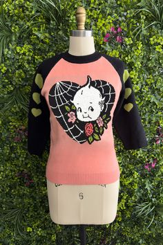 I am so thrilled to announce my newest collab with Kewpie®! The cutest and softest sweater featuring my Kewpie® Spiderweb Love design. With black contrast sleeves with green hearts and contrast collar. This is a fitted sweater so please check the size chart for measurements. Viscose blend. Frog Girl, Folk Punk, Green Hearts, Love Sweater, Waxing Poetic, Fashion Couture, Contrast Collar, Softest Sweater, Fitted Sweater