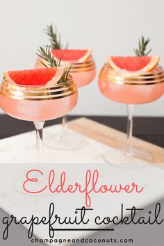 three glasses filled with watermelon and rosemary garnish cocktails on a tray