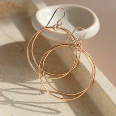 Elevate your style with the Parallel Hoops. Handcrafted from 14k gold fill, these double hoops will energize your look and make you stand out from the crowd. So make a statement with these modern hoops– because it's your time to shine. Made in 14k Gold Fill Hoops measure 1.5" in diameter Modern Circular Rose Gold Jewelry, Modern Rose Gold Open Circle Jewelry, Modern Twist Hoop Jewelry For Everyday, Modern 14k Gold Filled Hoop Jewelry, Modern Rose Gold Jewelry With Ear Wire, Modern 14k Gold Filled Small Hoop Earrings, Modern 14k Gold Filled Small Hoop Jewelry, Nickel-free Modern 14k Gold Filled Jewelry, Modern Recycled Gold Hoop Earrings For Everyday