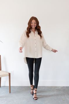 Whether your headed to the office or to dinner, our Wesley Button Up Top is your go-to! This lightweight top can be worn alone or use it as a layering piece under a statement jacket. Button up Collar Long sleeve Longe hemline Non see through Lightweight Textured material Slight stretch True to size Machine wash cold Model wearing size S 100% Polyester Model measurements:- Height: 5'5- Bust: 34"- Waist: 25"- Hip: 36" Effortless Fall Shirt For Day Out, Button-up Fall Blouse For Day Out, Fall Button-up Blouse For Day Out, Relaxed Fit Blouse With Button Closure For Layering, Button-up Blouse For Layering, Blouse With Button Closure And Shirttail Hem, Relaxed Fit Button-up Blouse For Layering, Oversized Button-down Tops For Layering, Oversized Buttoned Tops For Layering