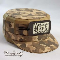 a camouflage hat with the words welcome home soldier on it