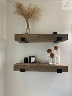 two wooden shelves with some items on them