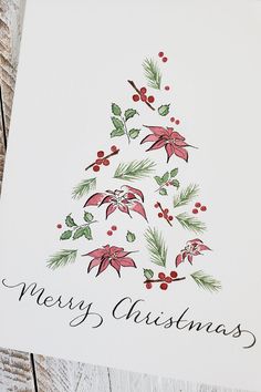 a christmas card with holly and poinsettis in the shape of a tree