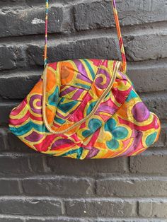 Fun and fabulous 1980's painted leather purse with a wild multi coloured pattern.  Made of 100% leather and in beautiful condition  13 inches by 9 inches  Shoulder strap has a 17 inch drop Retro Multicolor Bags For Party, Evening Multicolor Shoulder Bag With Adjustable Strap, Retro Multicolor Party Bags, Vintage Multicolor Bag With Adjustable Strap, Vintage Multicolor Satchel Shoulder Bag, Vintage Multicolor Shoulder Bag For Summer, Retro Multicolor Clutch Bag, Retro Multicolor Shoulder Bag For Evening, Retro Multicolor Evening Bag