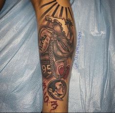 a man with a tattoo on his arm