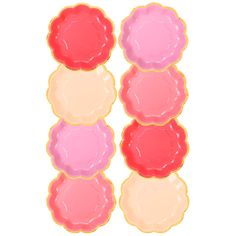 four pink, yellow and red plates are stacked on top of each other