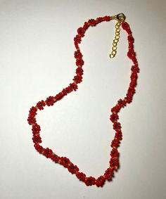 - One of a kind & Handmade  - necklace is 17 inches long but has a 2 inch extension chain making it in total 19 inches in length  - Gold lobster clasp and extension chain connector pieces Red Flower-shaped Beaded Necklaces For Gifts, Red Flower-shaped Beaded Necklace For Gift, Red Flower-shaped Beads For Gifts, Adjustable Red Flower Beaded Necklace, Adjustable Red Flower Beaded Necklaces, Handmade Adjustable Necklaces For Holidays, Adjustable Beaded Necklace For Christmas, Beaded Chain Necklace With Flower Pendant For Gifts, Beaded Flower Choker Necklace As Gift