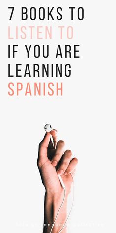 a hand holding a string with the words 7 books to listen to if you are learning spanish