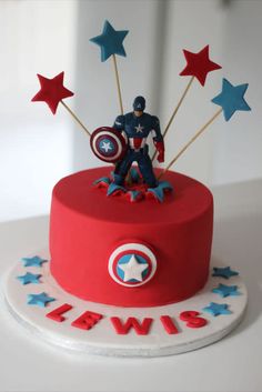 a captain america themed cake with stars on top