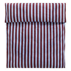 a red and white striped bed spread