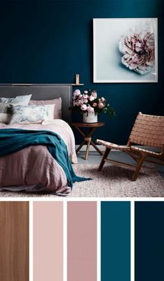 a bedroom with blue walls and pink accents