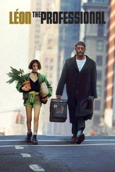 the man and woman are walking down the street with suitcases in their hands,