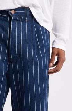 Move from desk to street in these relaxed pants designed with thin stripes and crisp pleats. Zip fly with button closure Front slant pockets 100% cotton Machine wash, tumble dry Imported Relaxed Pants, Stripe Pants, Fabric Gift Bags, Pants Design, Blue Pants, Fabric Gifts, Free Fabric, Striped Pants, Blue Stripes