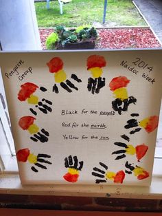 a handprinted sign on the window sill that says black for the people read for the earth you know for the stars