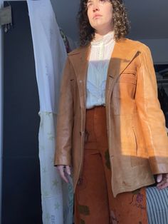 Classic 70's leather jacket. Perfectly soft leather, silky satin lining, some stains/wear that adds to the character, but nothing that detracts from the wearability. Tagged 42L, fits up to women's L. shoulder to shoulder 18" Bust 43"  Waist 38" Length 34" Sleeve 26" Retro Leather Jacket For Spring, Spring Retro Leather Jacket, Vintage Outerwear With Leather Lining For Work, Vintage Leather Outerwear For Fall, Retro Leather Jacket For Fall, Vintage Fitted Outerwear With Leather Lining, Vintage Leather Jacket With Long Sleeves For Fall, Fitted Vintage Outerwear With Leather Lining, Vintage Leather Outerwear For Spring