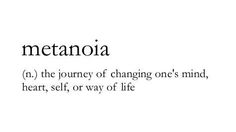 the words metanoia are written in black and white ink on a white background