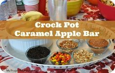 the crock pot caramel apple bar is ready to be served with candy and candies