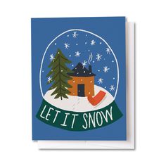 a snow globe with the words let it snow and a small house inside, surrounded by snowflakes