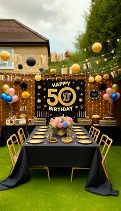 a 50th birthday party with black and gold table cloths, balloons, and decorations