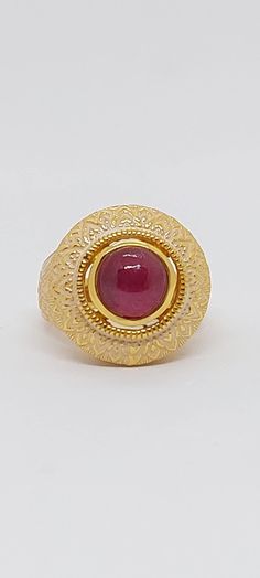 RUBY 24k Gold Plated over 925 Sterling Silver Ring. Ruby Ring. Gold Plated Sterling Silver Ruby Ring. Genuine gemstone Ring. Size 7. Product Info: -Ruby Measurements: 6x6mm round. -Stone: Ruby. - Stone Color: Red -Finish: 24k Gold Plated Over 925 Sterling Silver. -Metal: Solid Gold Plated/ Sterling Silver. -Ring Size: 7 -Handmade item. -Made in USA. -Nice Gift box included. Gold Ruby Signet Ring With Polished Finish, Gold Ruby Ring With Round Stone, Fine Jewelry, Gold Ruby Ring Stamped 14k, Formal Gold Ruby Ring With Round Stone, Gold Ruby Ring With Cabochon In 14k Gold, 14k Gold Ruby Cabochon Ring, Gold Round Ruby Ring Fine Jewelry, Elegant 22k Gold Ruby Ring Gift, 22k Yellow Gold Ruby Ring