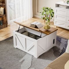 a living room with a couch, coffee table and bookshelf on the floor