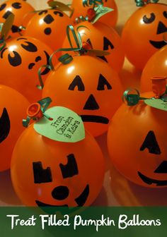 orange pumpkins with faces and green leaves on them are labeled treat filled pumpkin balloons