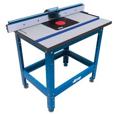 a table top router is shown with wheels on each side and a red disc in the center