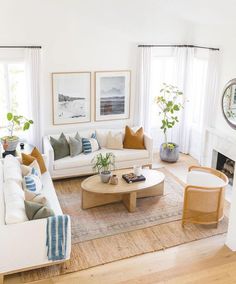 the living room is clean and ready for us to use it's natural wood flooring