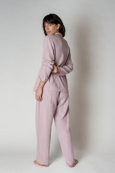 Made with 100% organic combed cotton, the Alaia Pajama Set is stylish, comfy, and sustainable, making them the perfect addition to any sleepwear collection. With a unique scalloped trim for a touch of sophistication. Due to the fabrication detailing, there may be slight variations throughout. Features-Relaxed silhouette long sleeve-Button front-One chest pocket-Scalloped edges at the sleeve and bottoms-Drawstring waist Please Note: Monogrammed items are hand stitched and may take up to 5 busines Solid Cotton Sets For Relaxation, Feminine Cotton Loungewear Sets, Organic Cotton Sleepwear For Spring, Solid Linen Loungewear Sets, Relaxed Long Sleeve Cotton Sleepwear, Solid Color Linen Loungewear Sets, Feminine Relaxed Fit Loungewear Sets, Solid Spring Sleepwear With Relaxed Fit, Spring Solid Color Relaxed Fit Sleepwear