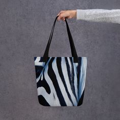 Introducing our Zebra Tote Bag, a stylish and versatile accessory for any occasion. Crafted with high-quality materials, this tote bag is designed to be durable and long-lasting. Its spacious interior provides ample room for all your essentials, making it the perfect choice for work or play. Tote Bag Product Details: • Quality Material: Crafted from 100% spun polyester fabric, ensuring both durability and a smooth finish. • Optimal Size: The bag measures 15″ × 15″ (38.1 × 38.1 cm), offering ampl Space Blanket, Towel Animals, Animal Blanket, Flower Iphone Cases, Flower Blanket, Art Tote Bag, Travel Tote Bag, Slides Women, Animal Canvas