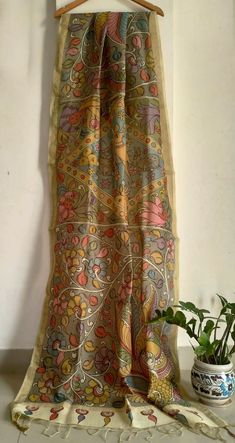 Hand-Painted Silk Kalamkari Shawl/Sarong - Traditional Indian Ethnic Wrap - Luxury Soft Scarf - Fashion Accessory for Women - Gift for Her" Kalamkari means - Art with the Pen done by hand Kalamkari is done with the ecofriendly vegetable colours. Milk is used in the process in order to get the vegetable colors on the fabric & River washed in flowing water. We are trying to preserve this age old tradition by giving handful work to weavers, and we want you to become part of this initiative by buyin Luxury Katan Silk Scarf With Traditional Drape, Luxury Shawl With Woven Motifs In Traditional Drape, Luxury Traditional Handloom Silk Scarf, Luxury Traditional Katan Silk Scarf, Kalamkari Shawl, Ikat Scarf, Handwoven Scarf, Flowing Water, Soft Scarf