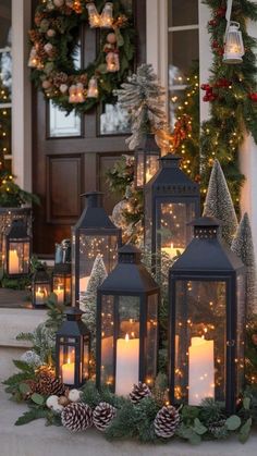 christmas decorations with candles and wreaths on the steps