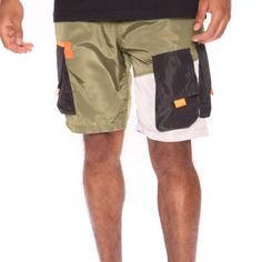 New With Tags Slim Fit Drawstring At Waist Cargo Pocket Detail 100% Polyester Msrp 29.99 Green Utility Shorts With Functional Pockets, Khaki Nylon Shorts With Pockets, Green Casual Cargo Shorts With Functional Pockets, Casual Green Cargo Shorts With Functional Pockets, Green Nylon Cargo Shorts, Green Shorts With Functional Pockets, Summer Streetwear Shorts With Functional Pockets, Green Bottoms With Functional Pockets, Green Short Bottoms With Functional Pockets