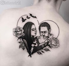 a man and woman with roses on their back shoulder, one is holding the other's hand