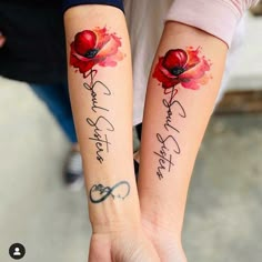 two people with matching tattoos on their arms holding each other's hands and the words love