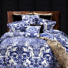 blue and white bedding with leopard print