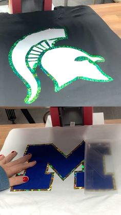 someone is painting the letters m and m on a canvas with glitters to make it look like they are made out of paper