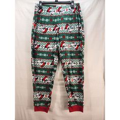 Get Ready For The Holidays In These Disney Minnie Mouse Pajama Pants! Made With Cozy Fleece Fabric, These Pants Are Perfect For Lounging Around The House. The Green Color And Holiday Theme Make Them A Festive Addition To Your Loungewear Collection. These Pajama Pants Are Designed For Women And Come In Size Large. They Feature A Fun Minnie Mouse Pattern And Are Perfect For Any Disney Fan. Whether You're Wearing Them Around The House Or Curling Up With A Good Book, These Pants Are Sure To Bring A Cozy Winter Bottoms For Pajama Party, Christmas Bedtime Long Bottoms, Cotton Pants For Christmas Loungewear, Cotton Lounge Pants For Christmas, Casual Christmas Sleepwear With Elastic Waistband, Cozy Bottoms For Winter Sleepover, Cozy Bottoms For Sleepover In Winter, Casual Holiday Sleepwear With Long Pants, Cozy Christmas Bottoms For Pajama Party