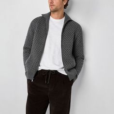 This mutual weave men's cardigan adds classic texture and warmth to your cold-weather looks. Crafted from a cotton-wool blend with an enlarged waffle-knit texture, this sporty cardigan is cut for an athletic-fit with a full zip closure, a high ribbed neck and slip pockets. Wear it over a tee with jeans or chinos. Closure Type: ZipperFit: Athletic FitNeckline: Collar NeckSleeve Length: Long SleeveFiber Content: 60% Cotton, 30% Nylon, 10% WoolFabric Description: KnitCare: Tumble Dry, Machine Wash… Men's Cardigan, Knit Texture, Mens Cardigan, Cotton Wool, Sleeve Cardigan, Athletic Fits, Long Sleeve Cardigan, Waffle Knit, Mens Long Sleeve