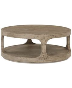 an oval coffee table with two shelves on each side