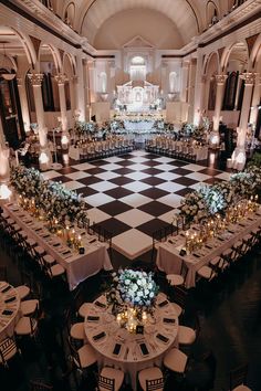 a large ballroom with tables and chairs set up for an event