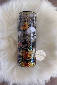 Hello Darkness! Skulls with fall orange leaves, taupe roses and beautiful coloring shifting glitter.  Tumbler is Skinny 20 oz, comes with lid and straw.   Each tumbler is coated in layers of food safe epoxy. Gives each tumbler a glass shine and smoothness. Tumblers are handmade with beautiful glitter to give that great sparkle! Tumbler is to be hand wash! Don't soak, microwave or put on the dishwasher. Care instructions are provided in each package.  Due to the nature of this Tumbler being handmade, there may be slight imperfections, glitter or rough spots. Erin Johnson, Food Safe Epoxy, Fall Orange, Skull Tumbler, Halloween Cups, Spider Webs, Glitter Cups, Halloween Vibes, Orange Leaf