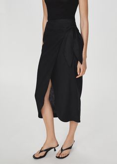 Bow linen skirt - Woman | MANGO USA Black Wrap Skirt, Linen Wrap Skirt, Sarong Skirt, Going Out Trousers, Linen Loungewear, Mango Outlet, Modest Clothing, How To Iron Clothes, Linen Skirt