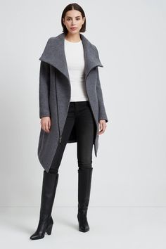 Stand out in our cozily chic Maren Coat. Maren features a diagonal two-way zipper and an asymmetrical bottom hem, coupled with a high wrap neckline that will keep you warm while always stylish. The tunic length offers a fit that’s both comfortable and flattering. Maren's handcrafted from Italian virgin wool and lined for added warmth and comfort. Best suited for cooler temps but generously cut for layering to extend wear through cold weather. [SPLIT] Chloe, in camel, is 5'10" (178 cm) tall, wear Modern Funnel Neck Outerwear For Fall, Modern Outerwear With Asymmetrical Zip For Fall, Winter Outerwear With Asymmetrical Side Zipper, Modern Asymmetrical Zip Outerwear For Fall, Chic Asymmetrical Zip Winter Outerwear, Chic Winter Outerwear With Asymmetrical Zip, Modern Fall Outerwear With Asymmetrical Zip, Chic Funnel Neck Outerwear For Work, Asymmetrical Winter Outerwear For Work