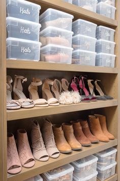 shoes are lined up on shelves in a shoe store with clear bins and plastic containers