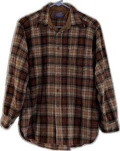 Classic Plaid Tops For Fall, Classic Brown Shirt For Winter, Classic Brown Button-up Flannel Shirt, Classic Brown Flannel Shirt With Pockets, Classic Brown Long Sleeve Flannel Shirt, Classic Brown Flannel Shirt For Fall, Classic Brown Flannel Shirt With Button Closure, Classic Flannel Shirt With Relaxed Fit, Classic Flannel Shirt In Relaxed Fit